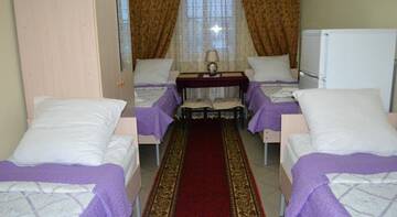 Четырехместный номер в Гостинице Homehotel