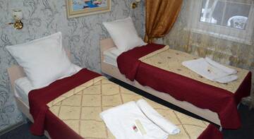 Двухместный номер «Комфорт» с  2 отдельными кроватями в Гостинице Homehotel